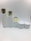 Various Painting Glass Cosmetic Packaging In Set White Bottle Gold Cap